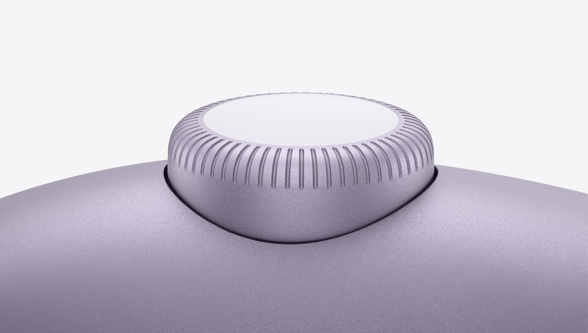 Pohled zblízka na korunku Digital Crown fialových AirPodů Max.